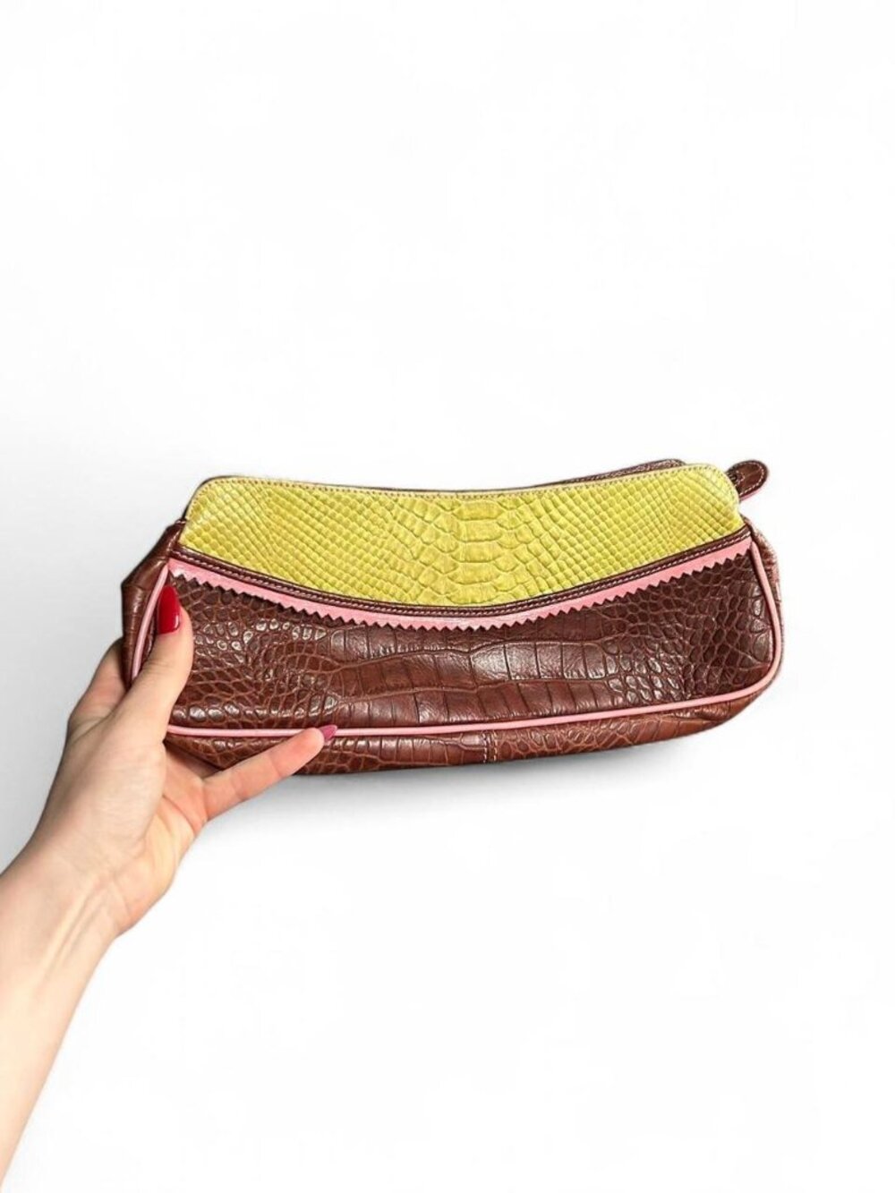brown and green crocodile print leather clutch bag